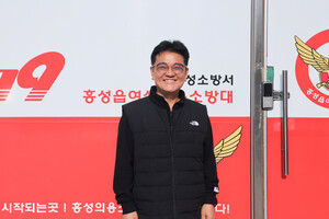 지난 13일, 홍성의용소방대에서 만난 김영환 씨가 환하게 웃고 있다.